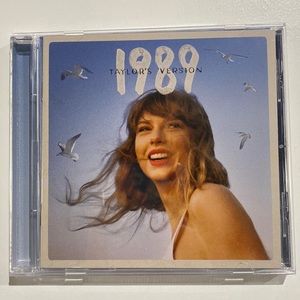 1989 cd Blue with Polaroids
